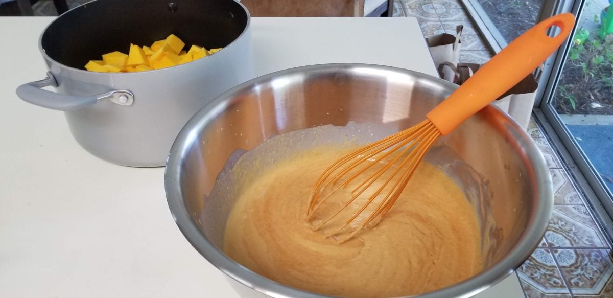 whisk coconut milk with Thai curry paste.